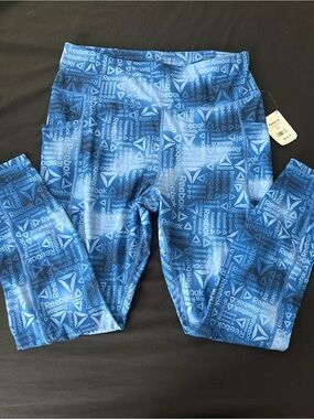 Reebok Blue All-Over Logo womens Performance Leggings